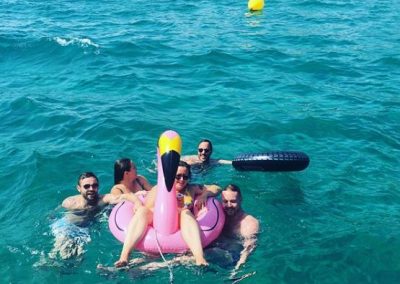 swimming barcelona sailboats